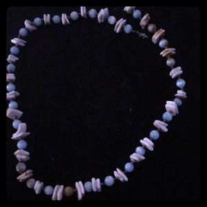 I’m selling a blue shell necklace